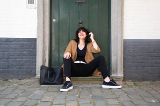 Model sitting on footstep