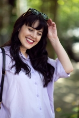 Model with sunglasses on her head